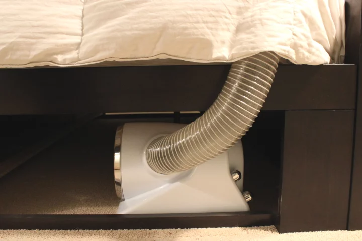 The Bedjet can be placed under the bed if there's room – just be sure to clean out any dust bunnies first