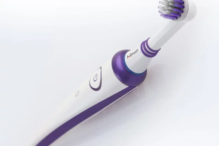 The T.brush in classic purple-and-white