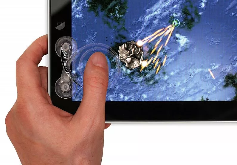 The Fling is an analog joystick that can be attached to the screen of an iPad, for better control when gaming