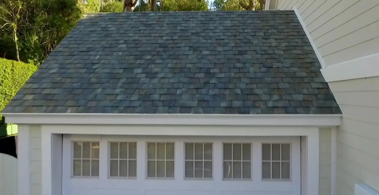 A home with Tesla's French slate solar roofing tiles