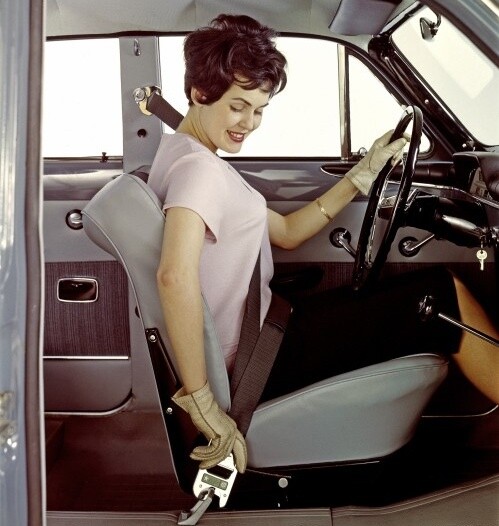Selling the seat-belt, 1959-style.