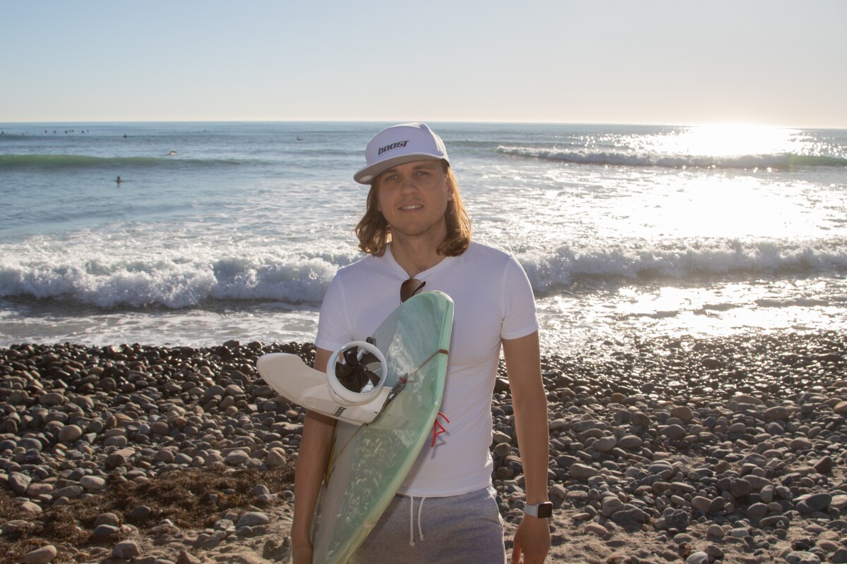 The Boost Surfing Fin was created by entrepreneurs Dmitri Kozhevnikov (pictured) and Alexei Ostanin