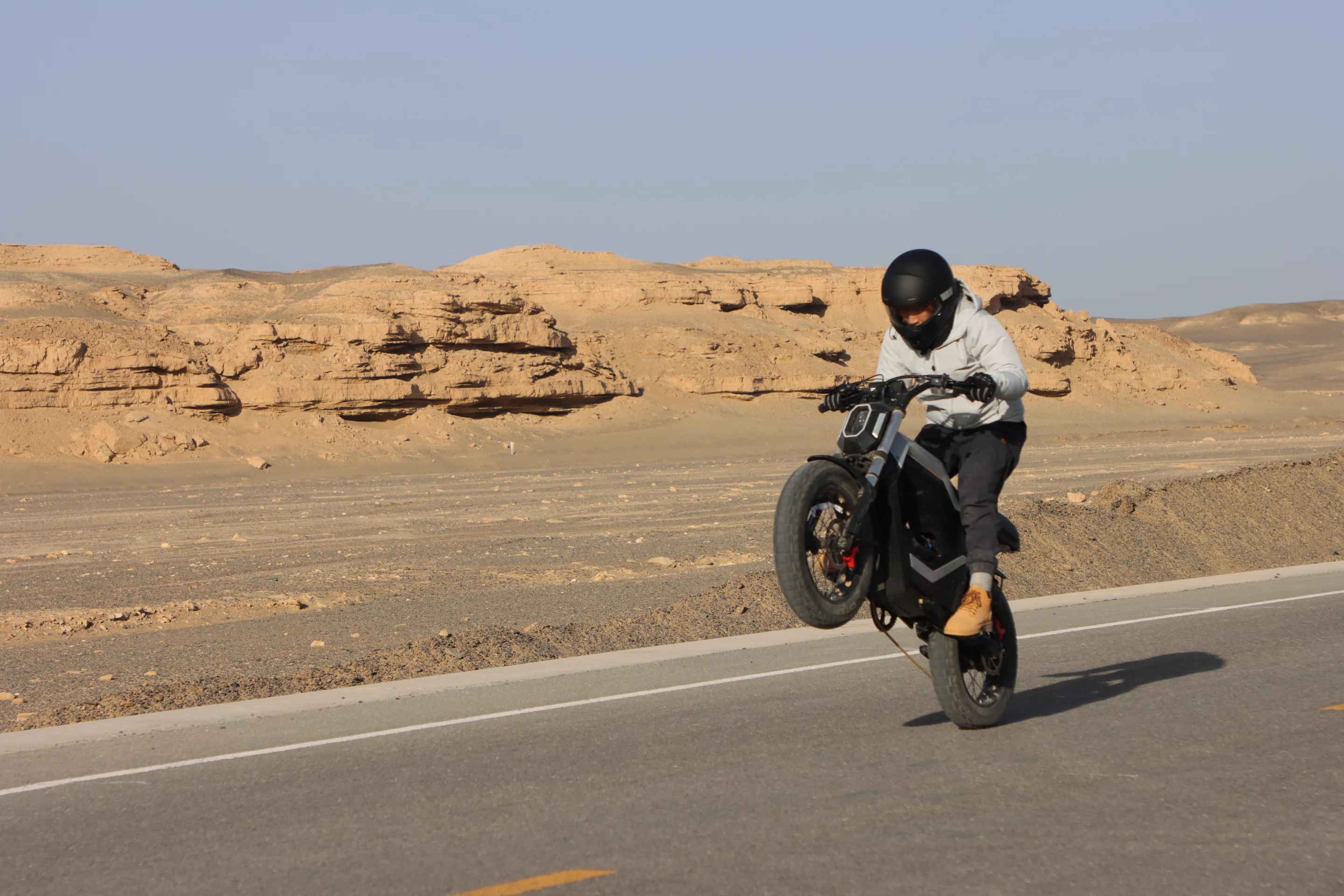 At the push of a button, it'll work with you to make wheelies a breeze