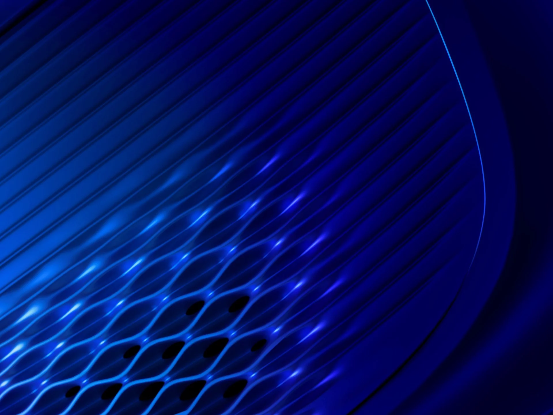 Scalloped grille work is designed to create a vortex effect, to help reduce turbulence and enhance aerodynamics