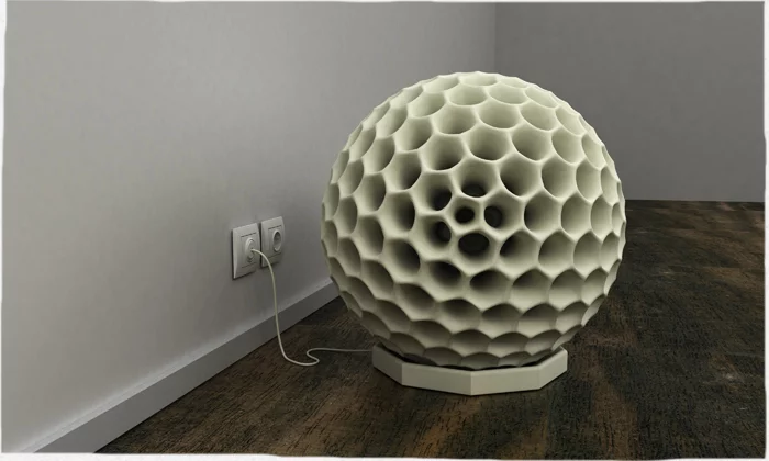 The Dustball robotic vacuum cleaner returns to its docking station for charging or when the dust collector is full