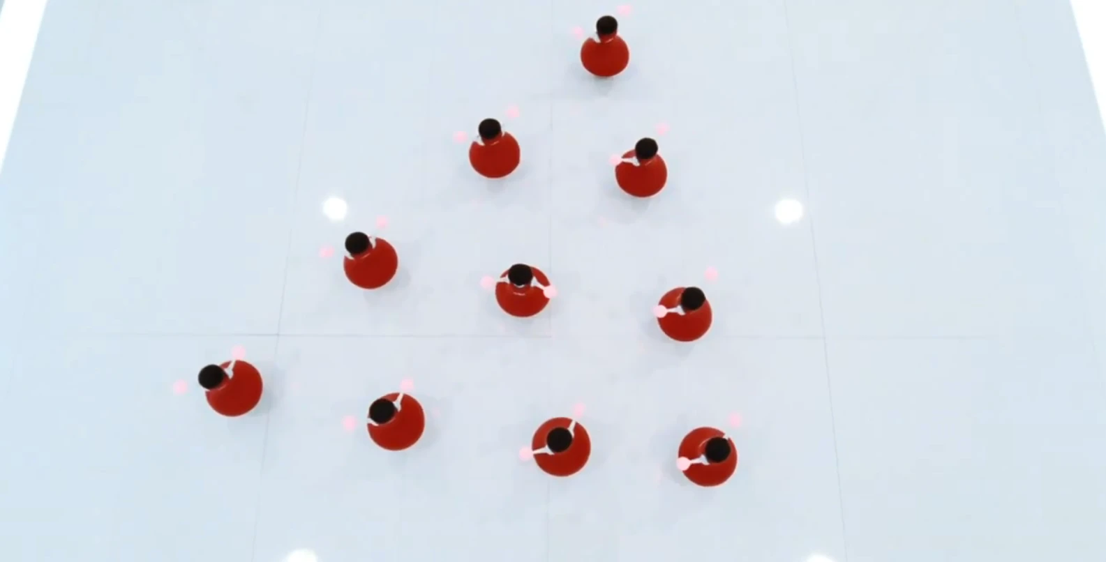 The Murata Cheerleaders do synchronized dance routines