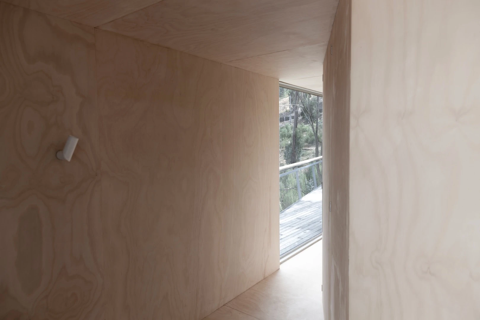 House 28's interior is simply furnished in marine-grade ply