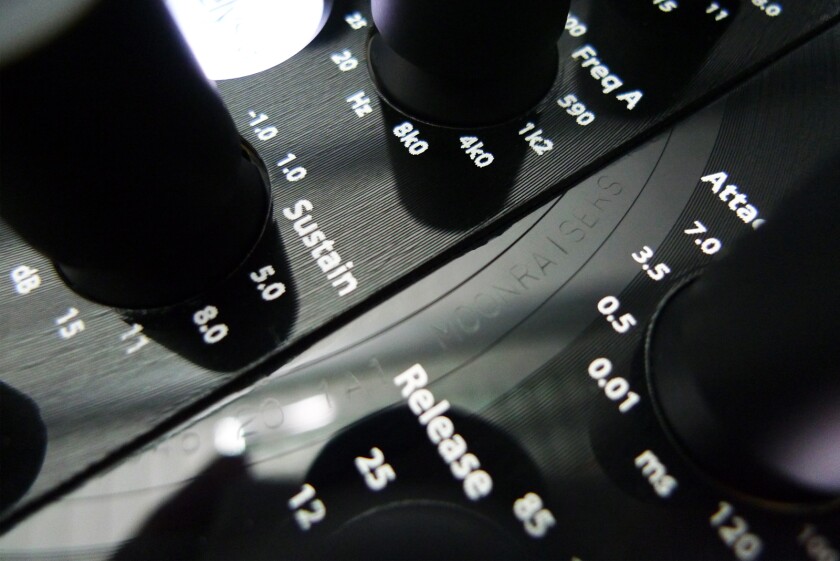 Close up of the front panel shows the vinyl grooves from the vinyl record used to make it