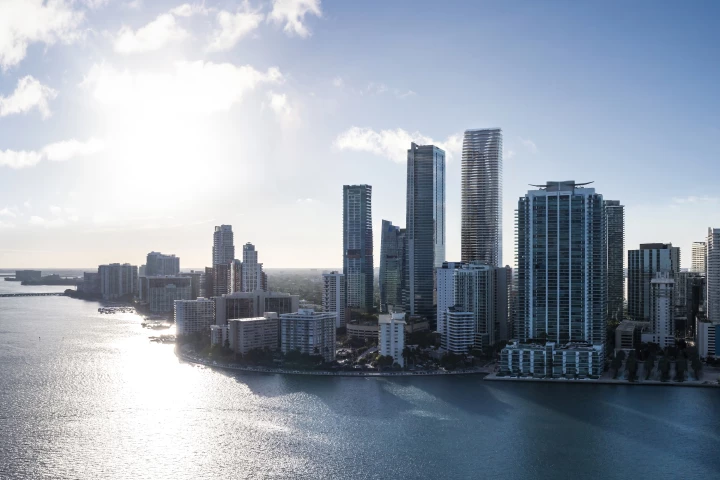 The Residences at 1428 Brickell skyscraper - the tallest of the buildings in this image - is currently under construction on the coast in Miami