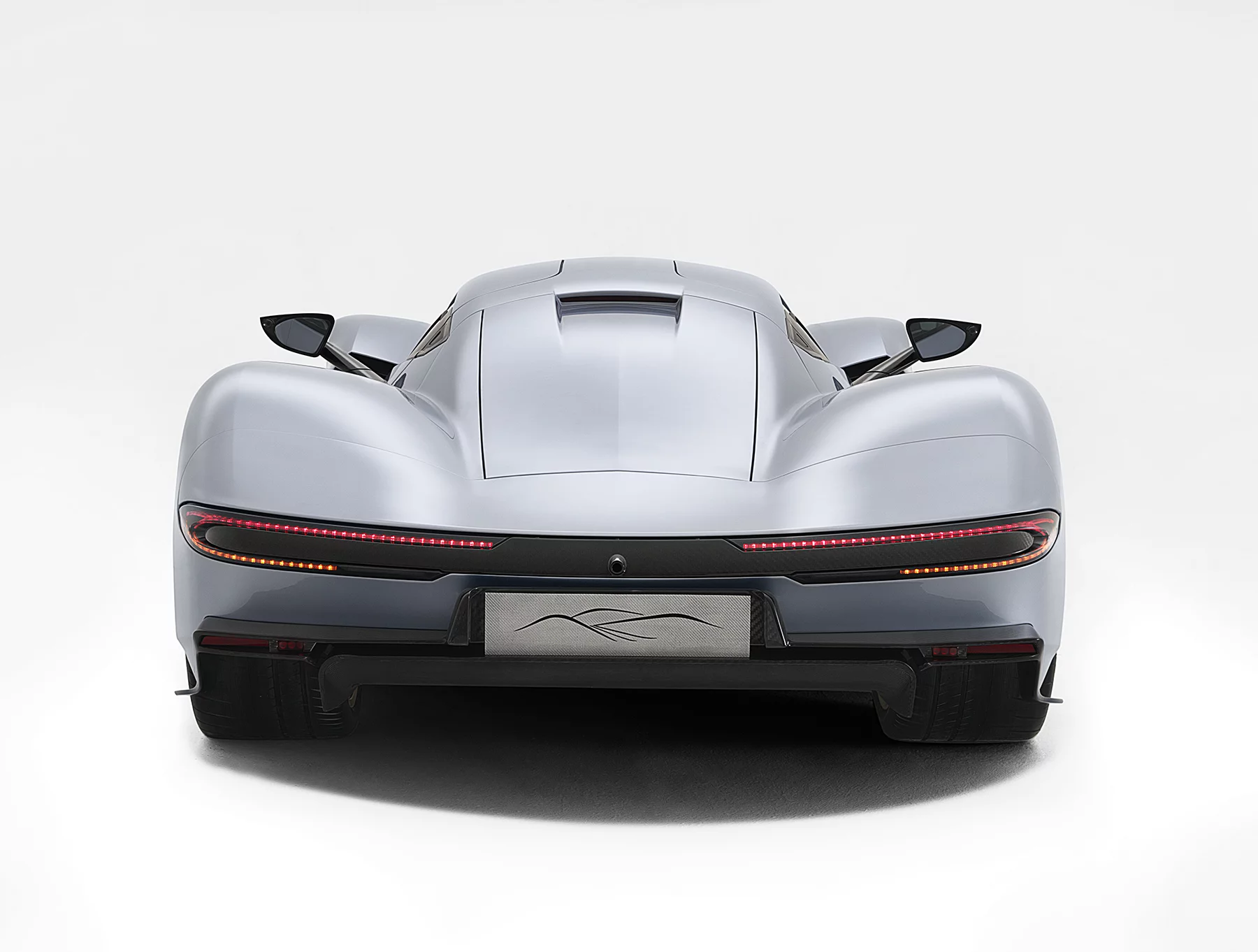 The original prototype had louvres running up its rear spine, but the new model has a cleaner body-color panel