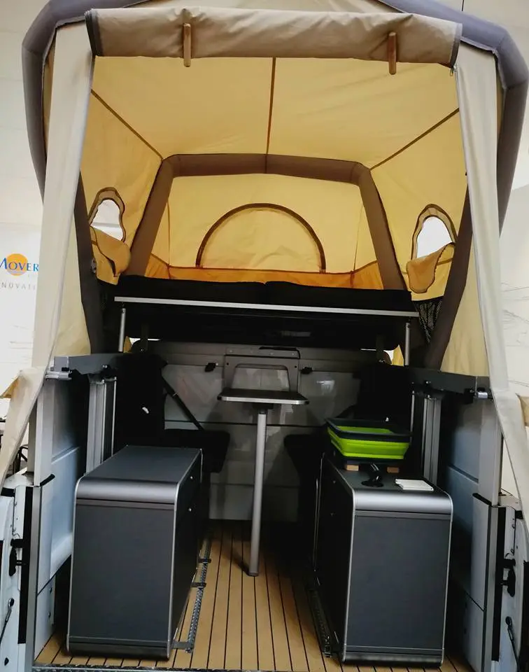 The GT Roof on a pickup truck with accompanying furniture