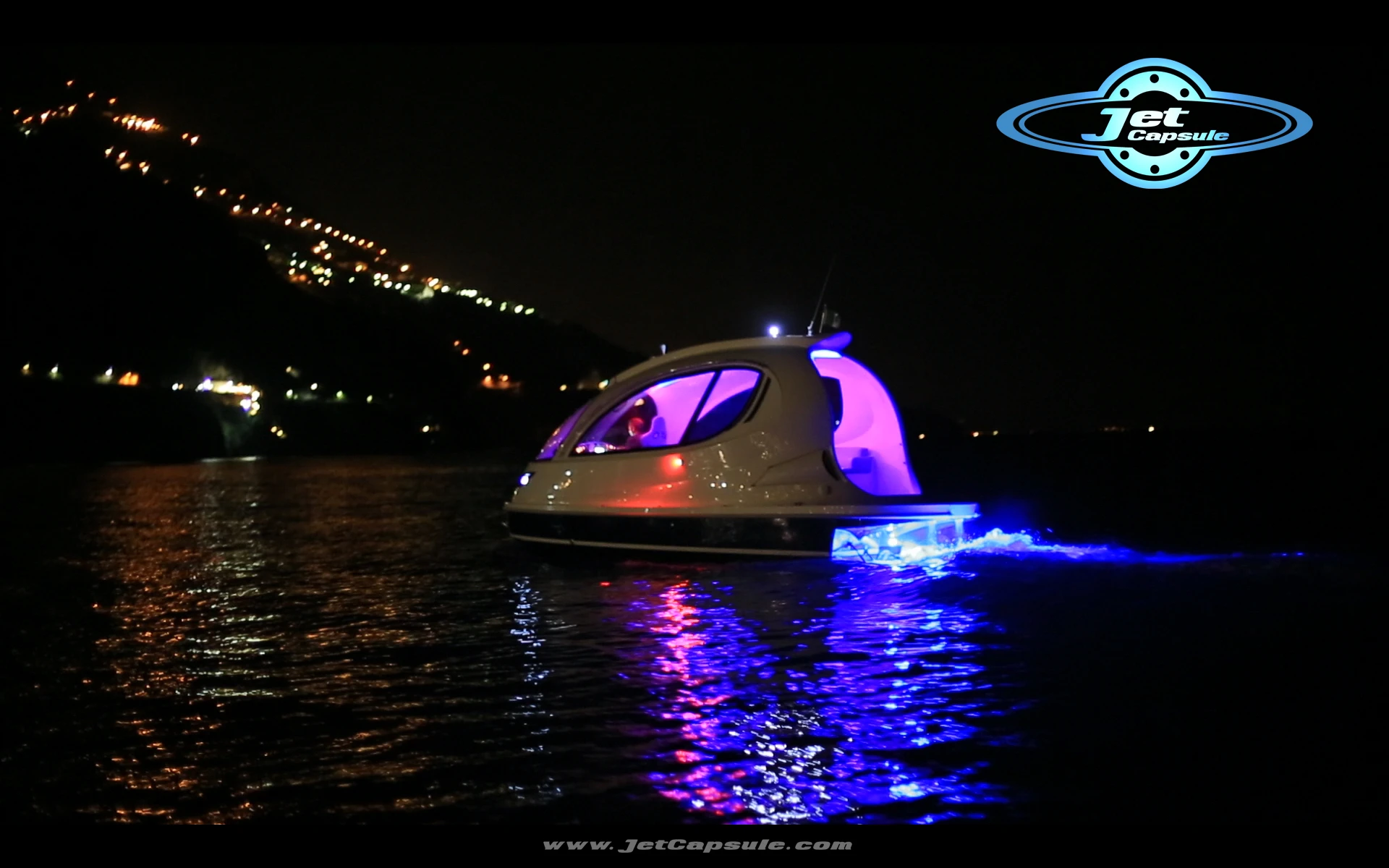 Jet Capsule cruises back to land at night