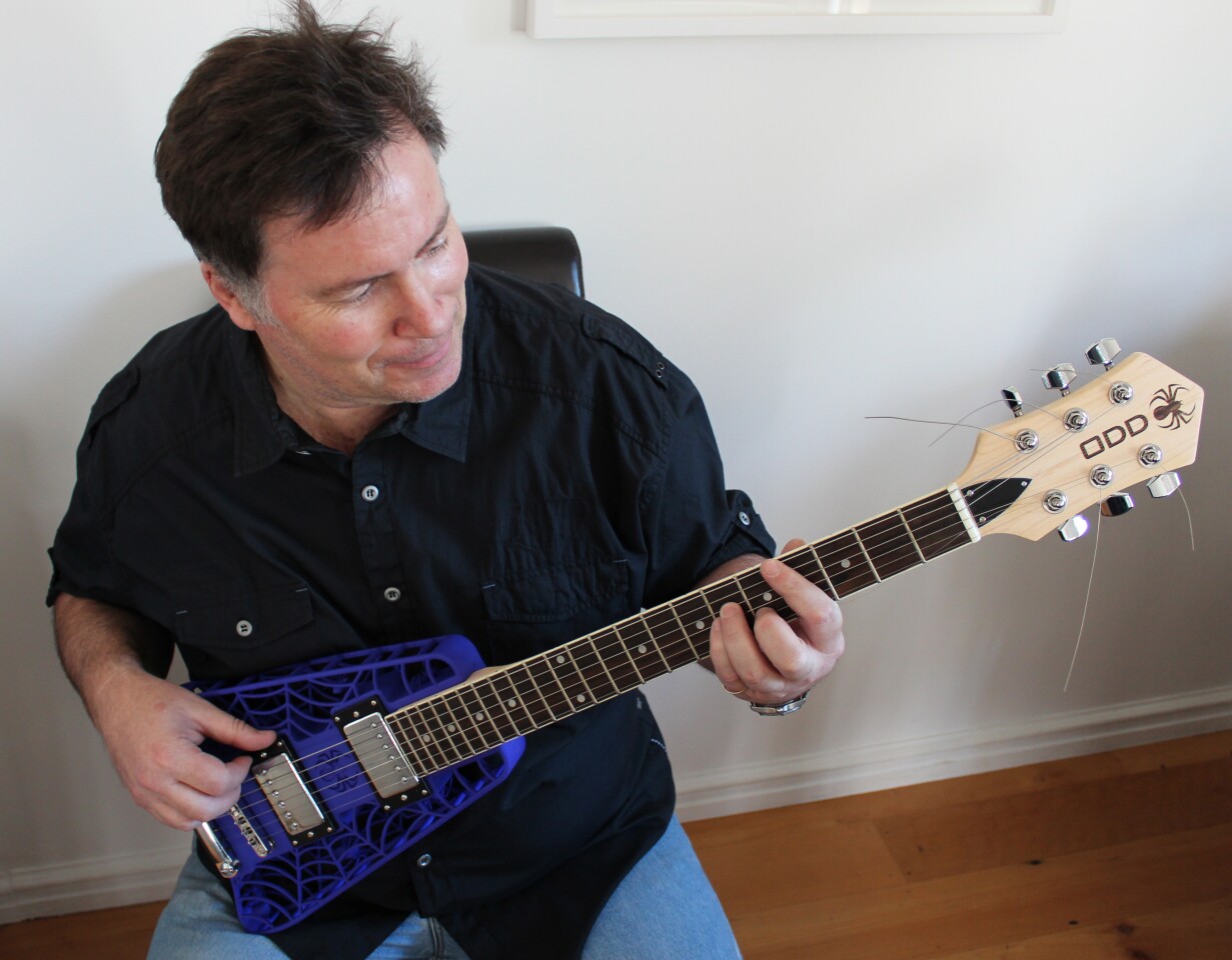 Olaf Diegel playing a blue ODD Spider model