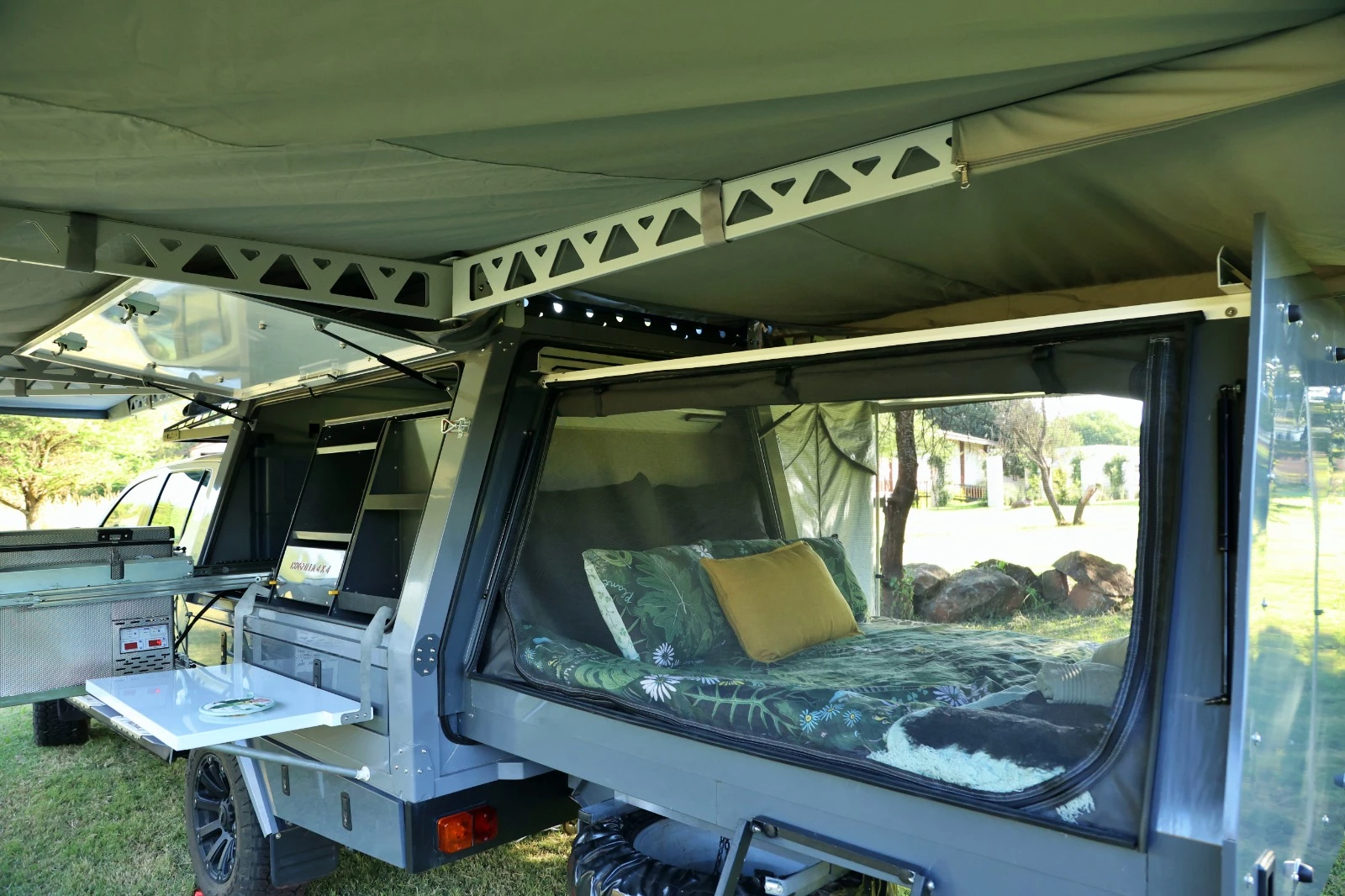 The rear bedroom includes PVC and mosquito mesh sidewalls