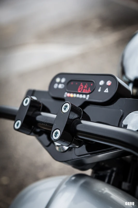 The Motogadget digital instrument panel sits in a housing 3D-printed by Sine Cycles
