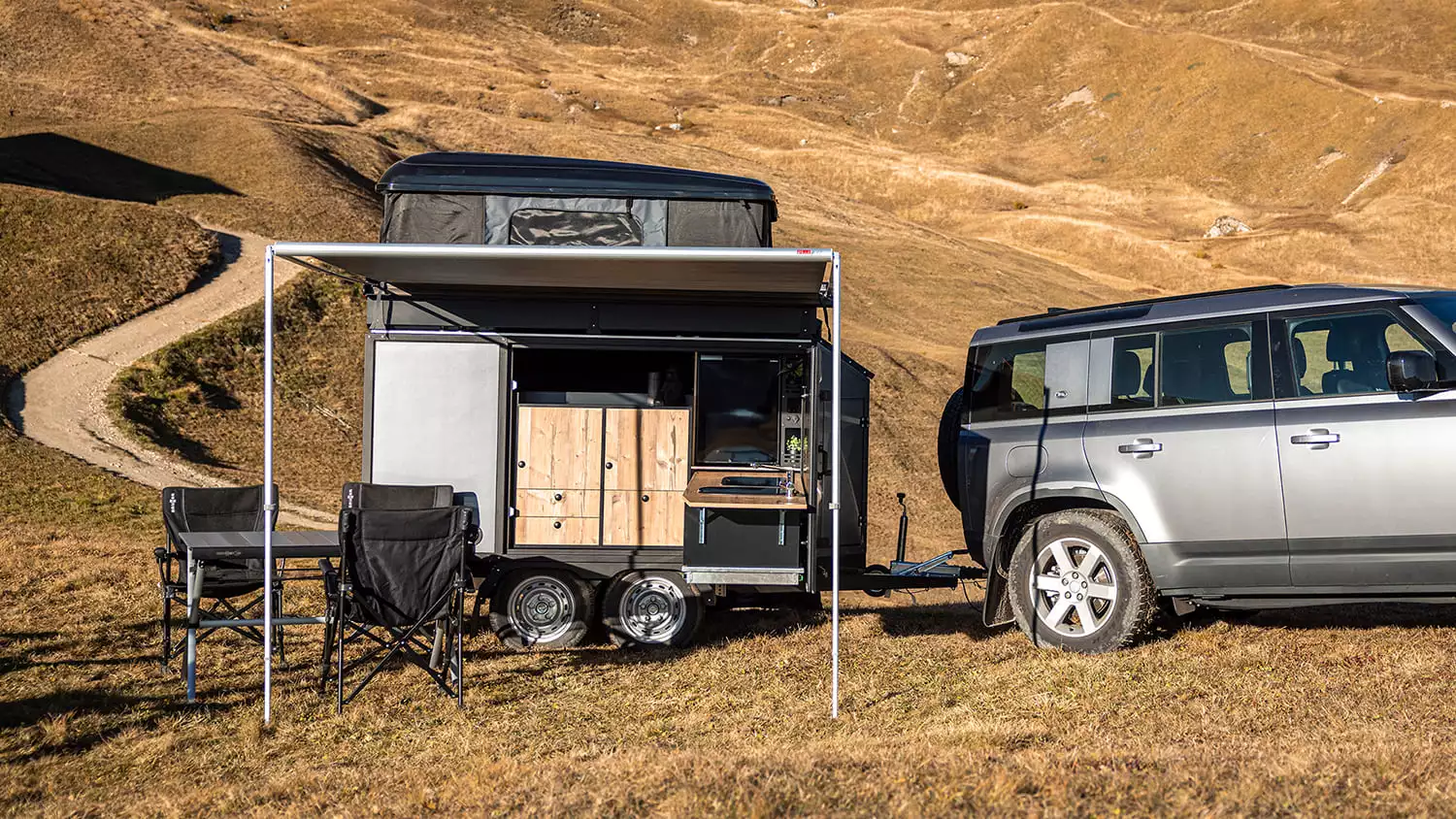 Blackcamp imagines its tent being towed to a scenic jump-off point where users can hike to mountain peaks, ride mountain bike trail networks, paddleboard lakes and rivers and otherwise enjoy the great outdoors