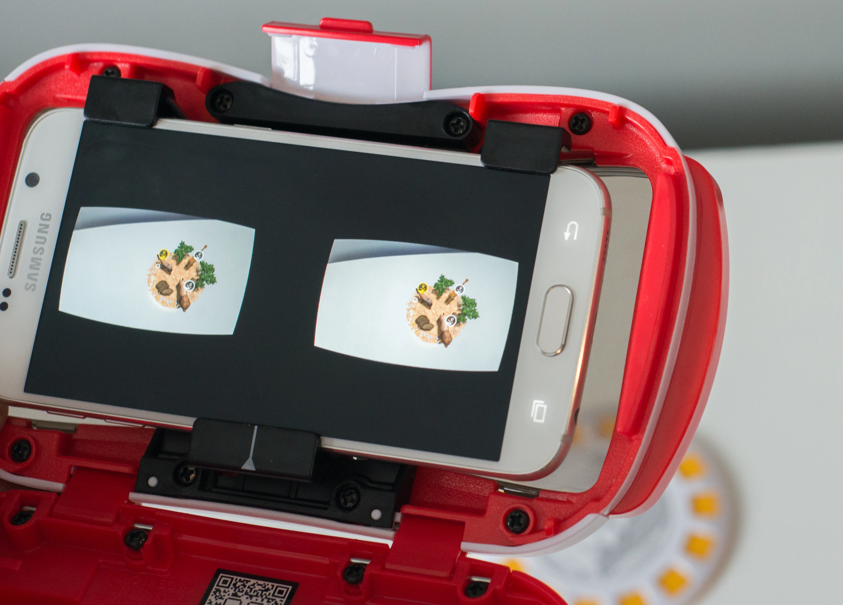 Users click augmented reality icons to access virtual reality content with the Mattel View-Master VR