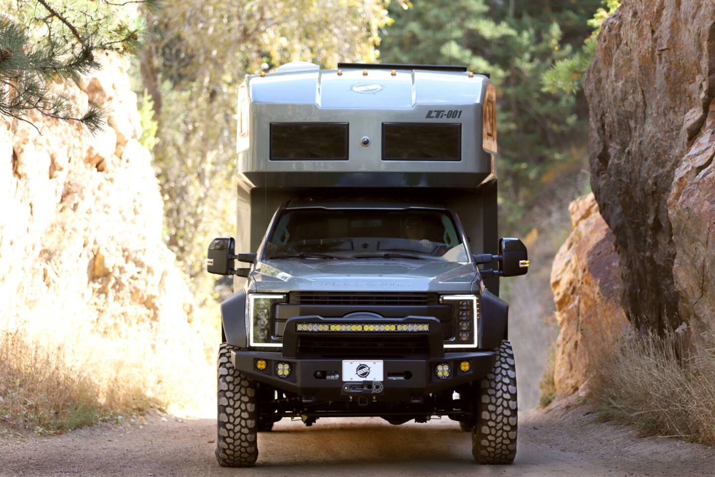 EarthRoamer starts with a Ford F-550, adding the auxiliary lighting, motorhome box, flared fenders and plenty more