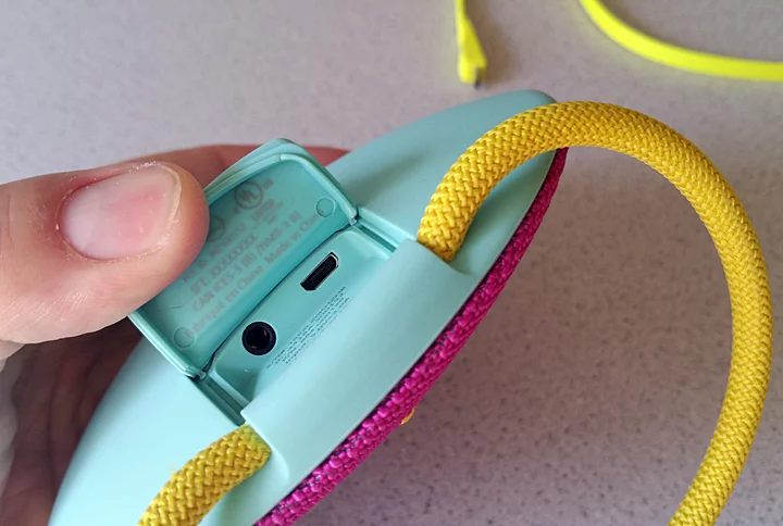 The Ultimate Ears Roll speaker features ports with waterproof connectors under a silicone seal