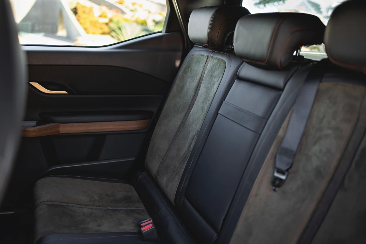 The Fisker Alaska rear bench seats three or folds down to expand the pickup bed