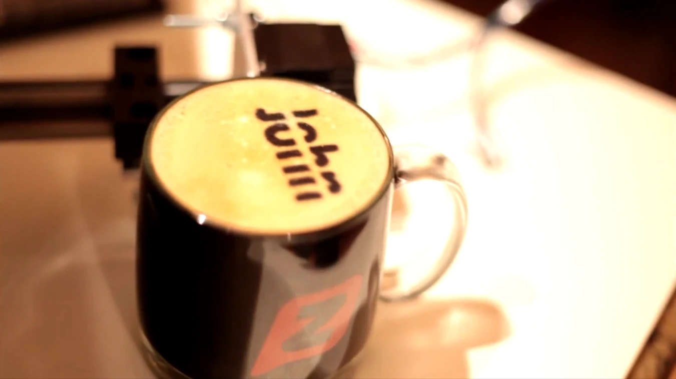 A start-up in Seattle has created the "Textspresso," a coffee machine that accepts and prepares specialized coffee orders via text message and will soon also print directly onto the coffee's top layer of cream