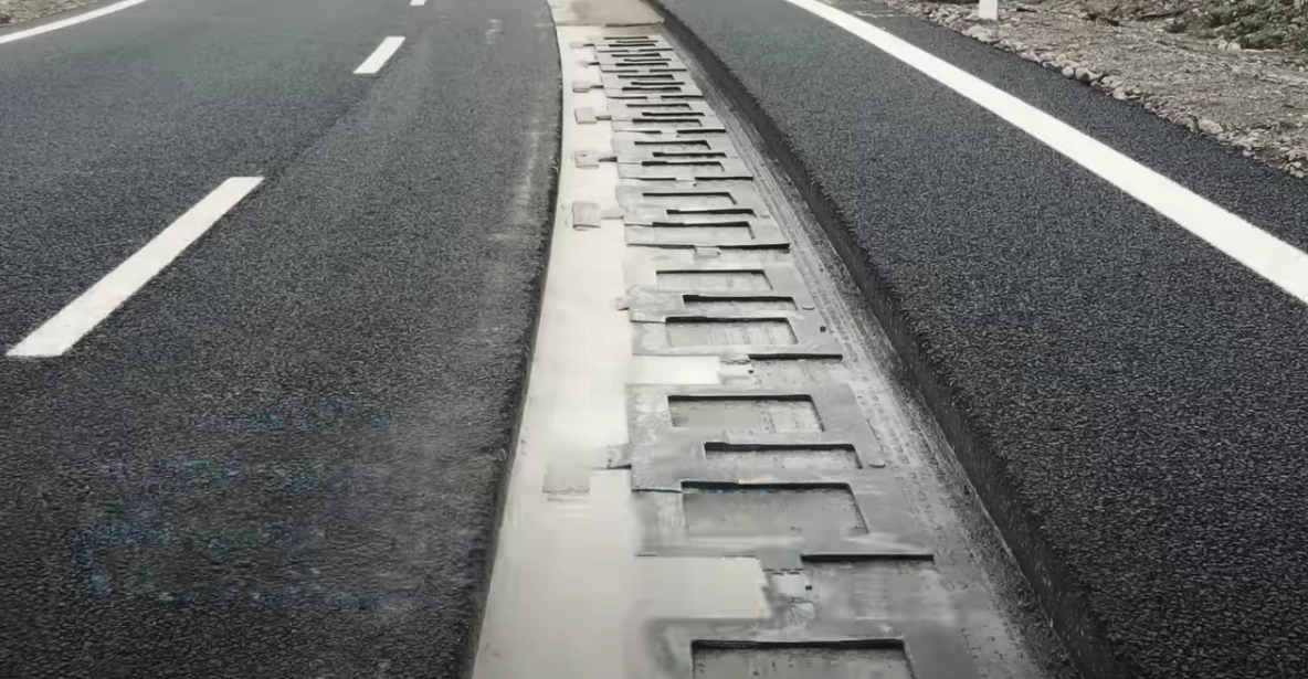 Under the asphalt, the DWPT system has a series of inductive charging coils