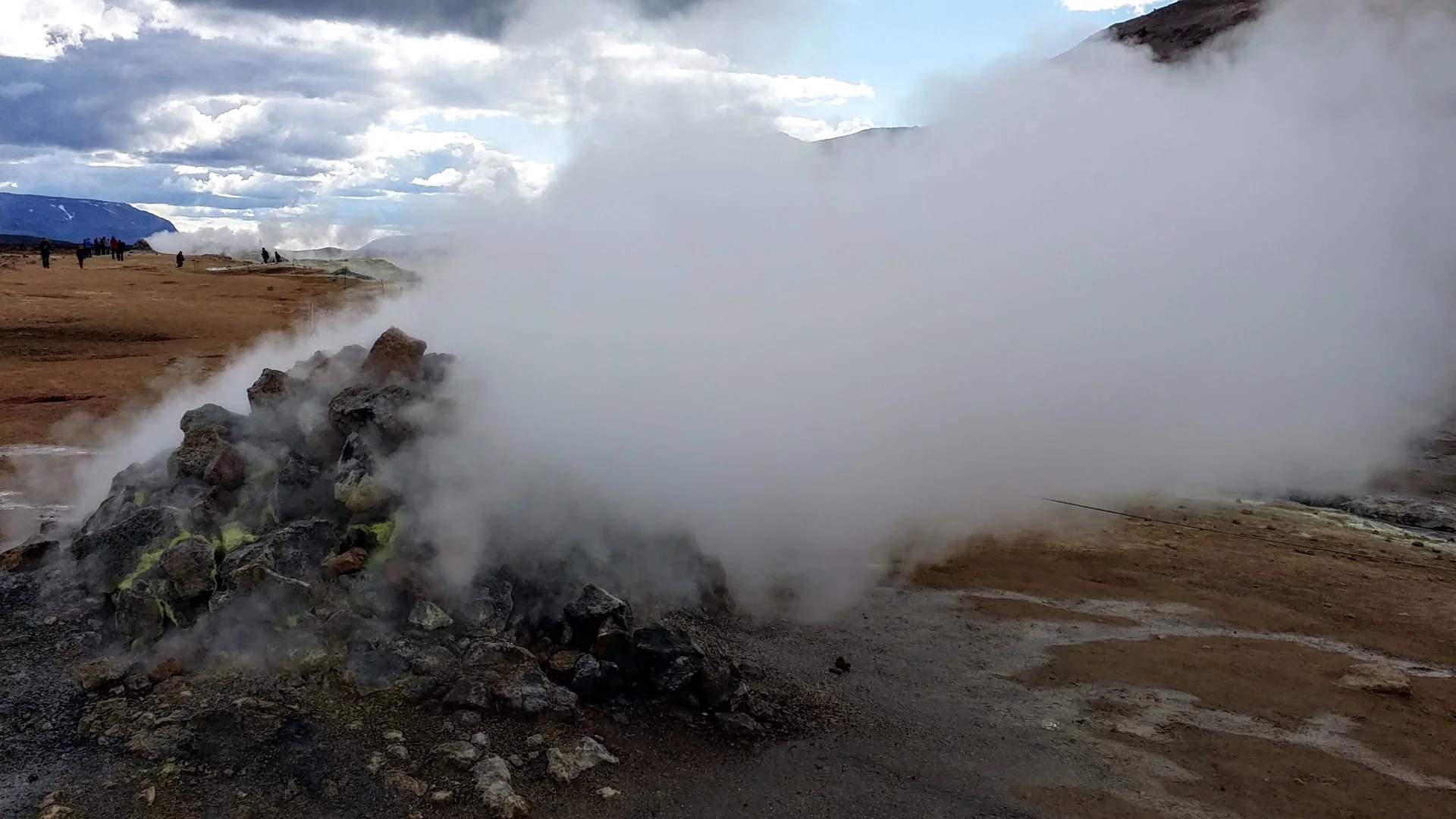 This steam vent, mounded with rocks, is found at Hverir, an area at the base of the Námafjall volcano in northeast Iceland. The popular tourist attraction features boiling pits of multi-hued mud and sulphur-spewing steam vents called fumaroles. Such vents can produce steam with temperatures as high as 280° F (138° C). Iceland's national power company, Landsvirkjun, uses the geothermal resources of this region to produce 3 MW of electricity.