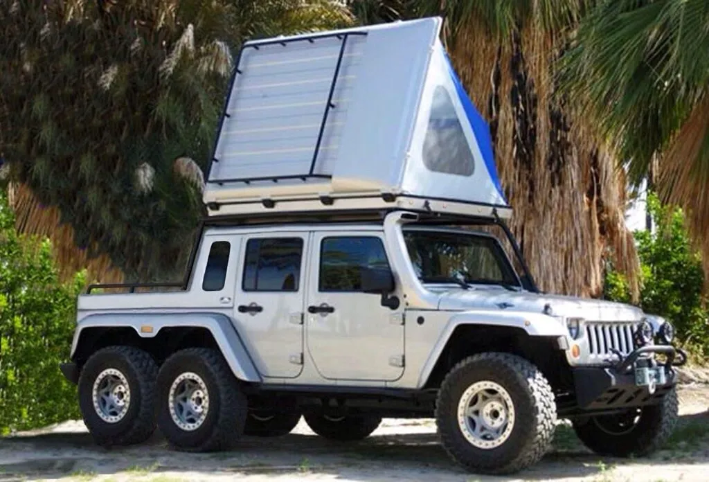The rooftop camper isn't part of the package, but may be auctioned separately