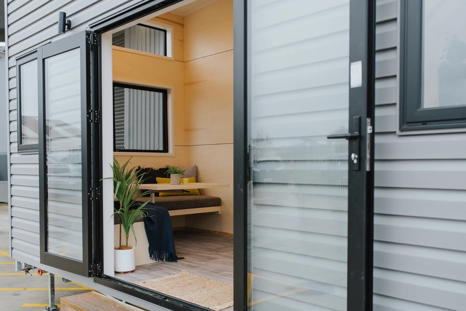 The Green Hill Farm Tiny House is accessed by double doors