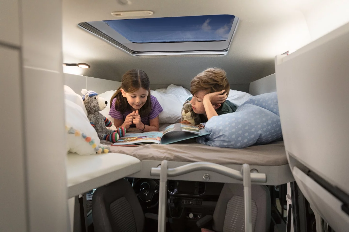 The optional kids' bunk bed includes a skylight overhead