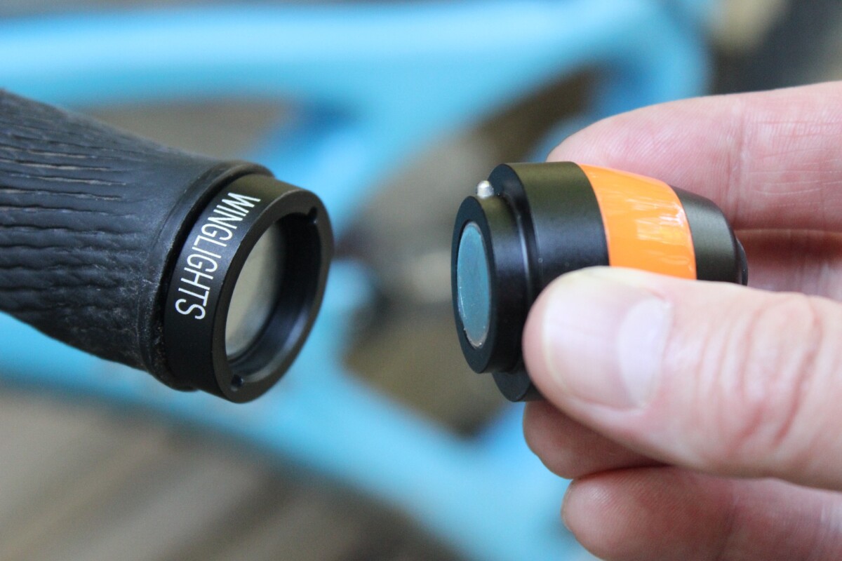 Each WingLight consists of a handlebar plug that replaces one of the bike’s existing plugs, and a corresponding waterproof LED module that fits into the end of it