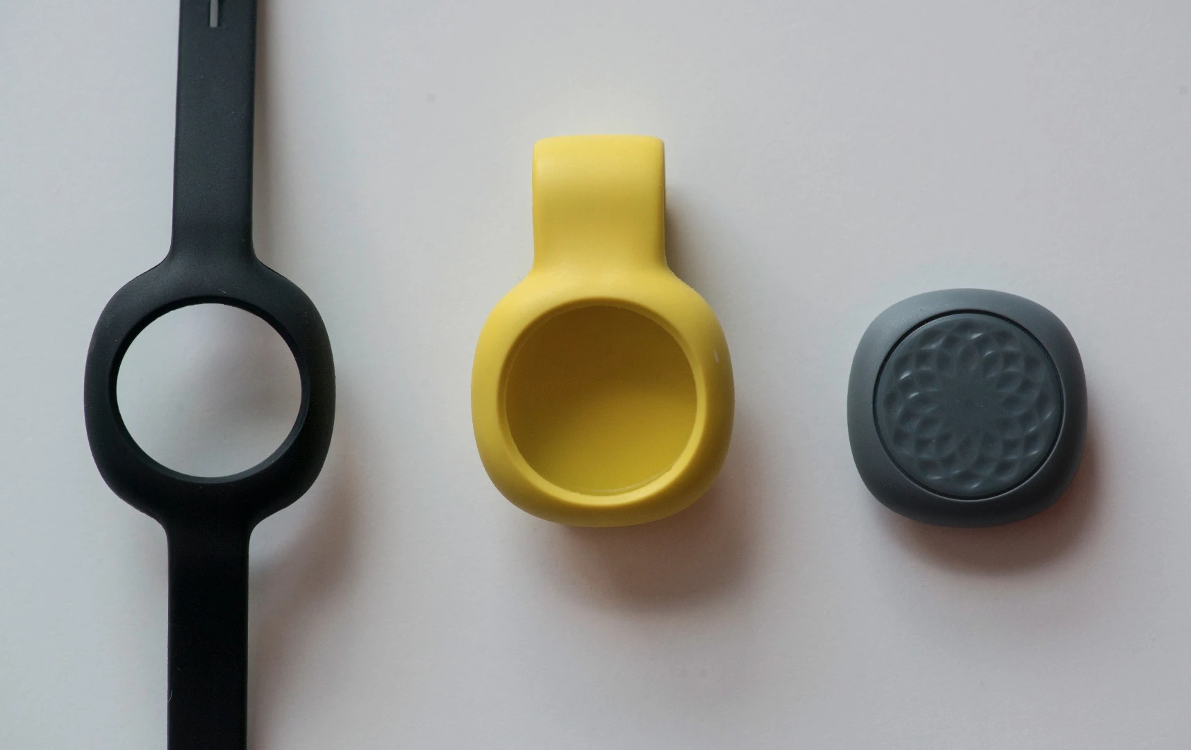 The Jawbone UP Move fitness tracker with the clip holder and optional wrist strap