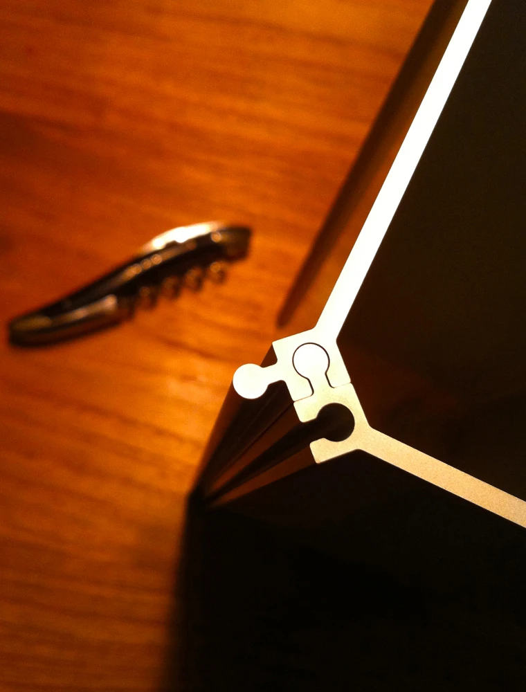 A close look at how the pieces of the Nucleus wine rack link together