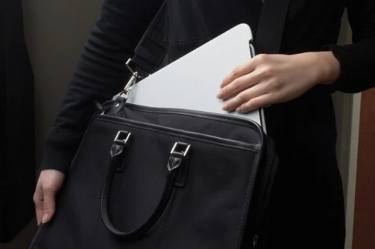 The lapdesk fits easily into a standard notebook bag