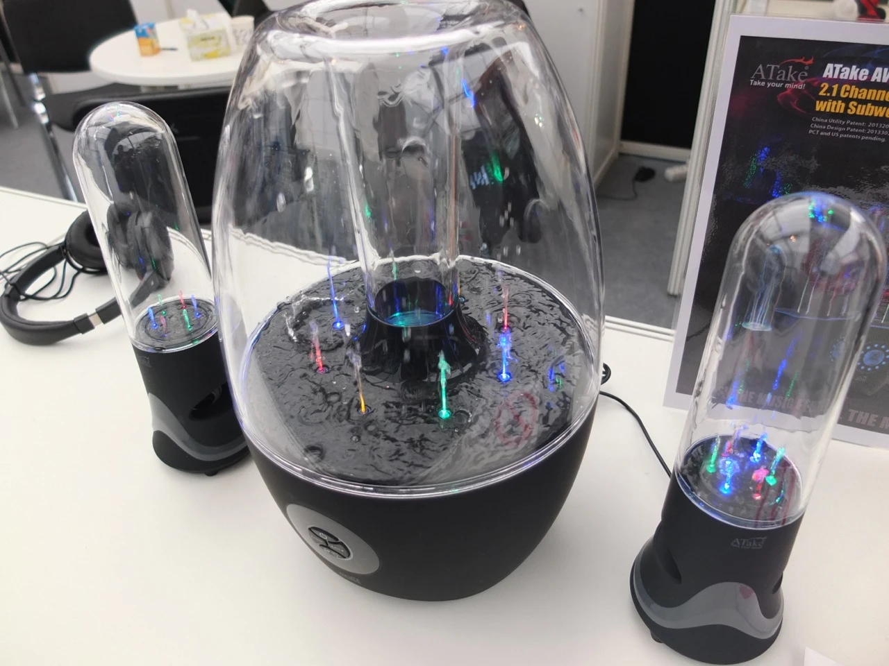 There are eight water jets in the subwoofer's transparent acrylic dome, and six rotating jets in each of the satellite speaker units