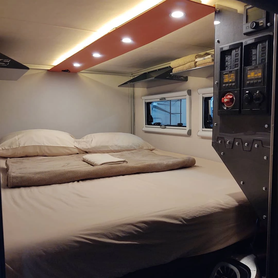 RKS gives the Purpose a cozy bedroom with queen bed, central lighting and plenty of windows