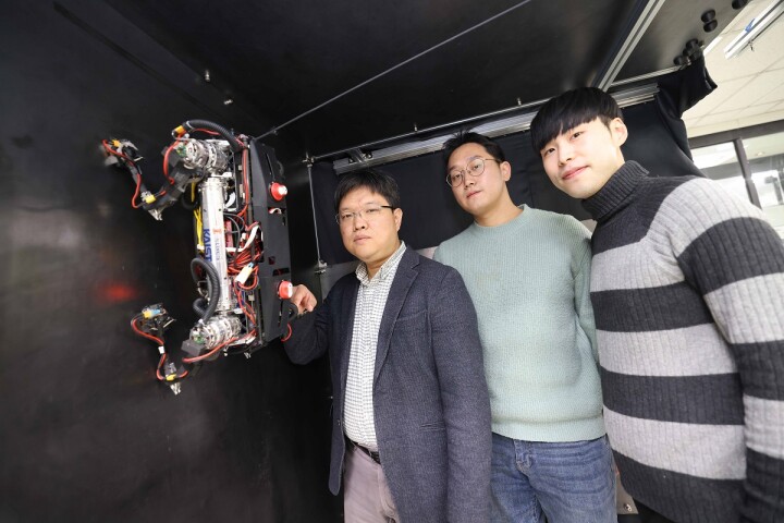 From left – Prof. Hae-Won Park, PhD student Yong Um and PhD student Seungwoo Hong pose with the MARVEL robot