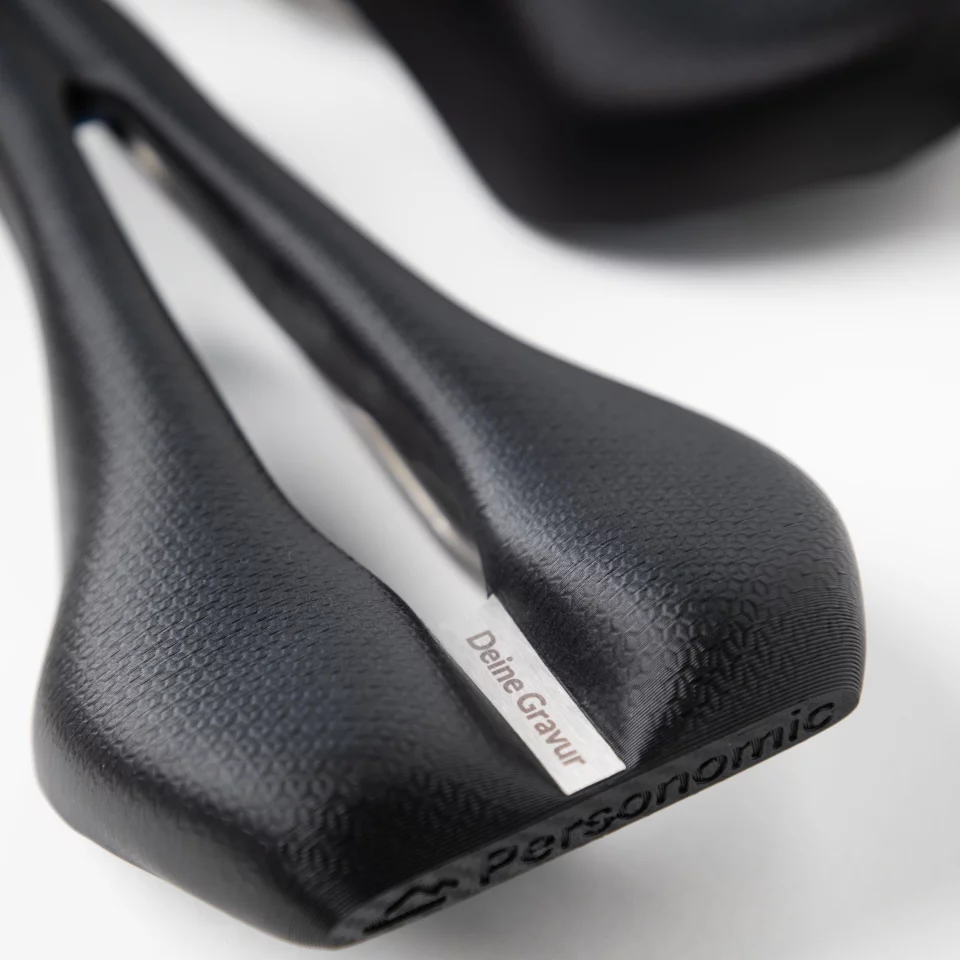 The buyer's name (or other text of their choice) is laser-engraved in the pressure-relief slot