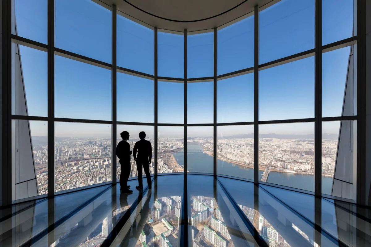 The Lotte World Tower's glass-bottomed observation deck – the world's tallest at a height of 497.6 m (1,633 ft) – is reached by the world's fastest elevator