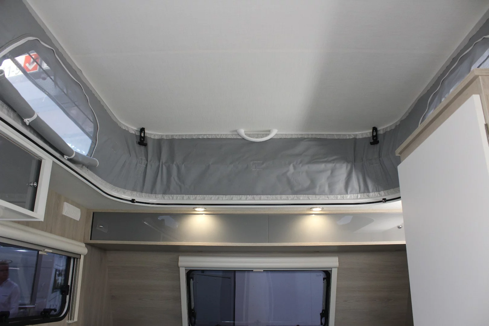 The pop-up roof on the Mini Freestyle 270 provides over 6 feet of headroom, making it a comfy, little trailer inside