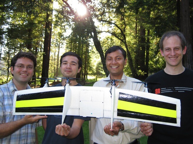 The Quadshot team and one of their prototypes