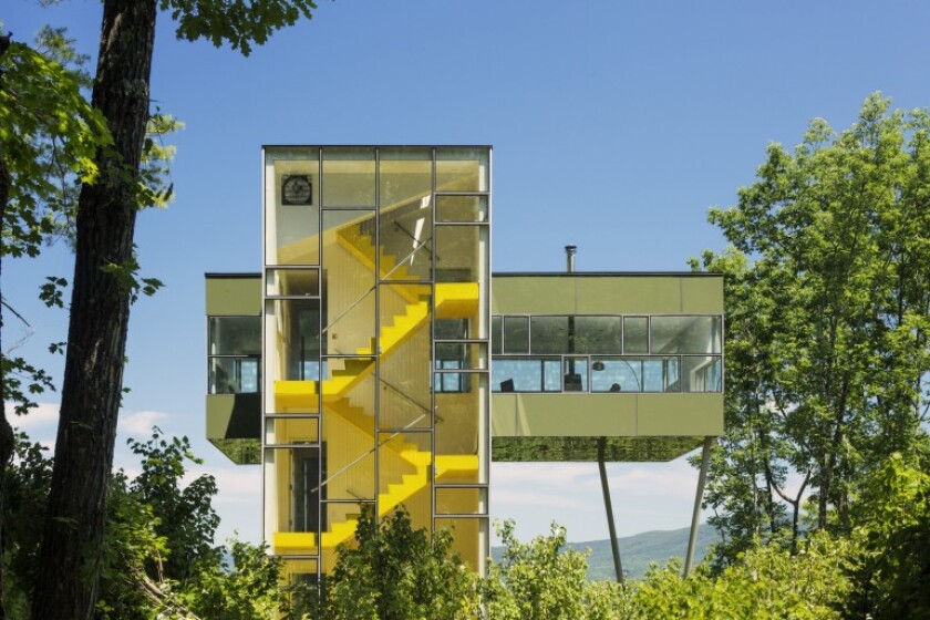 Comprising four floors, the top floor of the property rests horizontally atop the main tower structure (Photo: Paul Warchol)