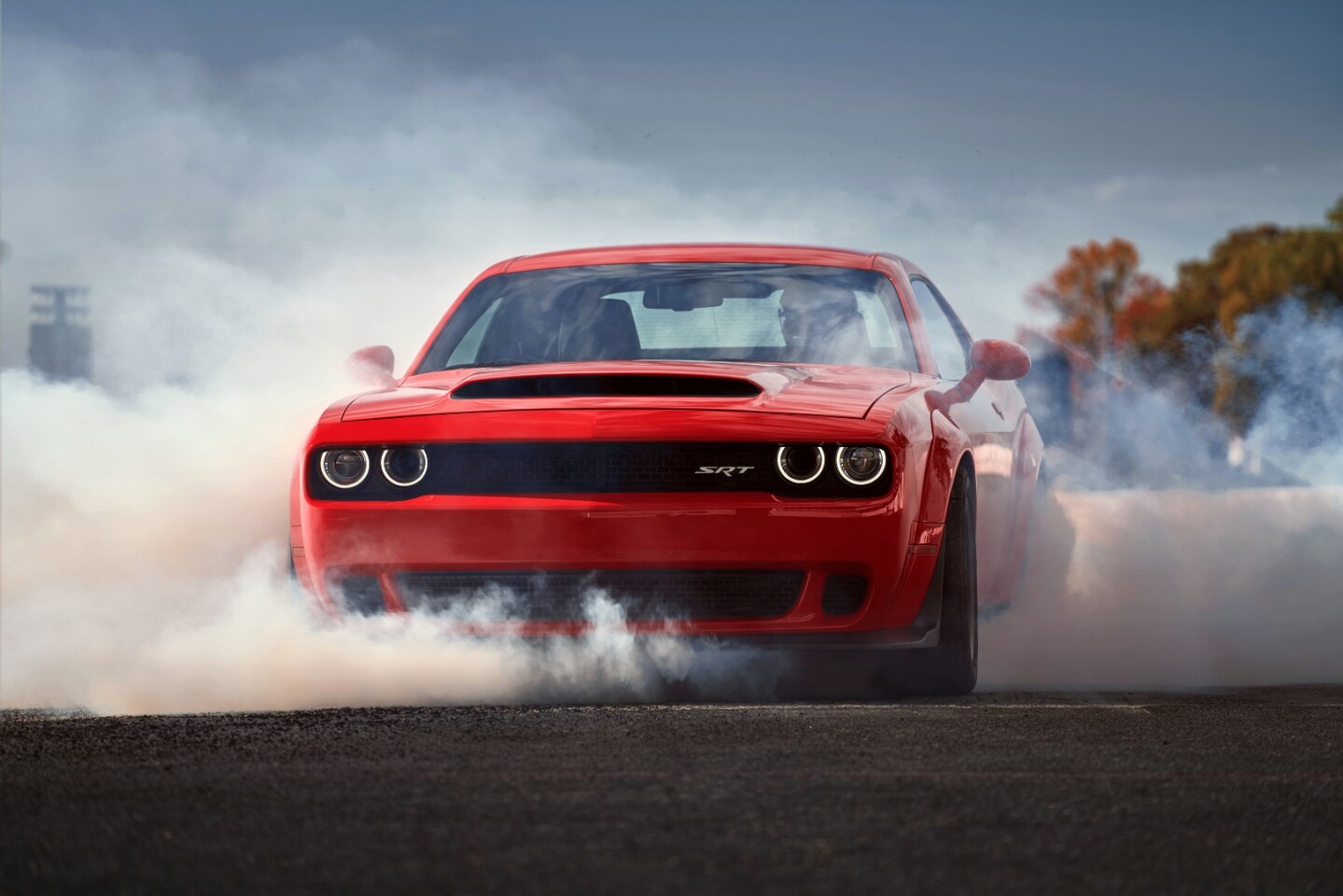 The Demon playing peek-a-boo through its own smoke
