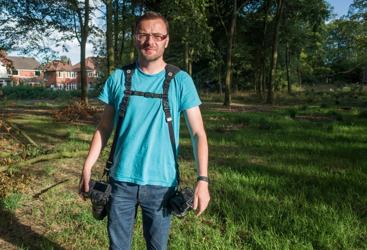 The Custom SLR Dual Camera Strap is a comfortable way to carry two ready-to-use cameras