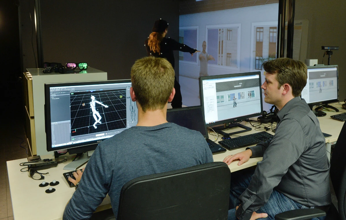 Researchers involved with ICSPACE monitor a full-body avatar