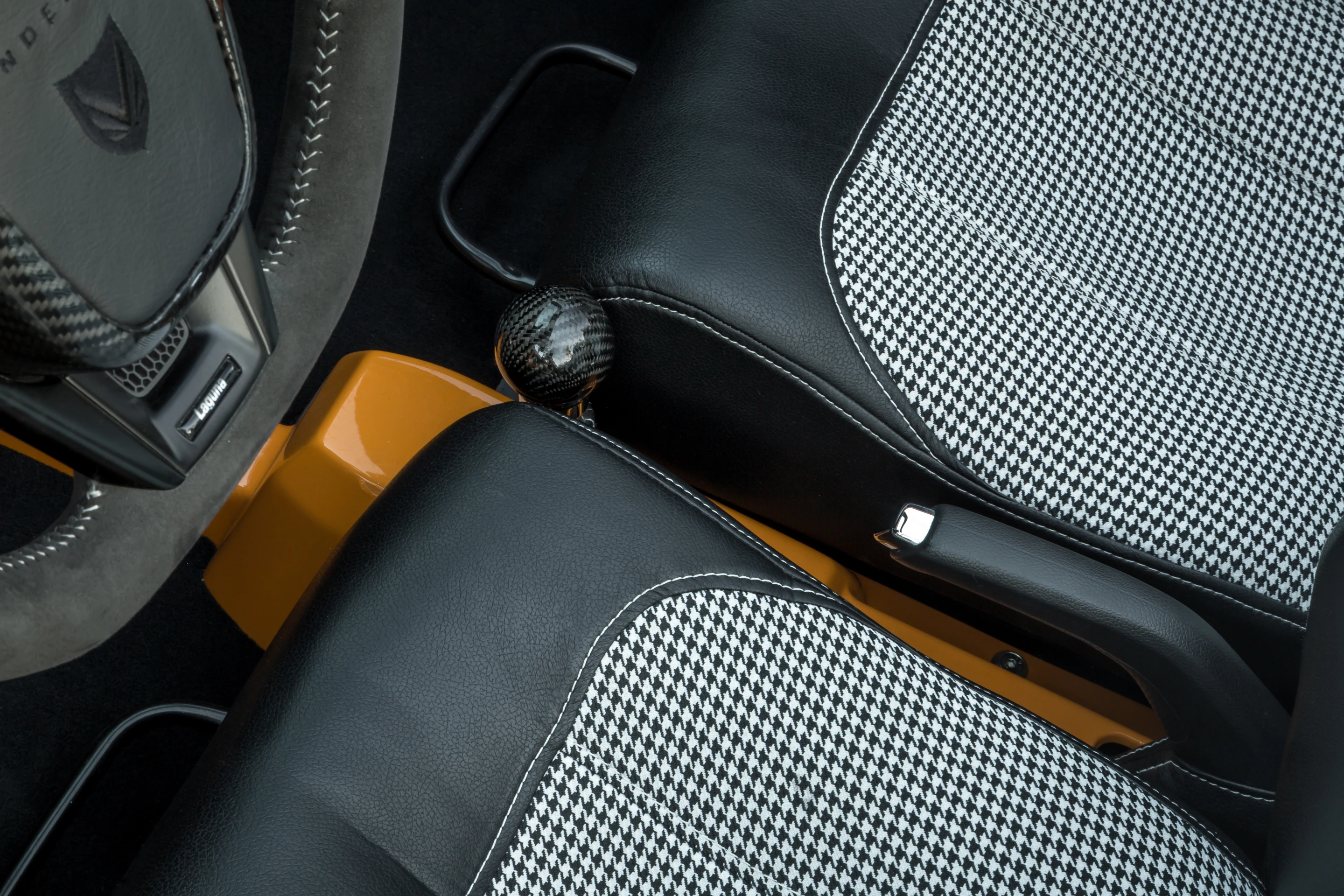 The Laguna puts its power down through a six-speed automatic with paddleshifters