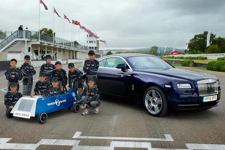 The students pose with their project