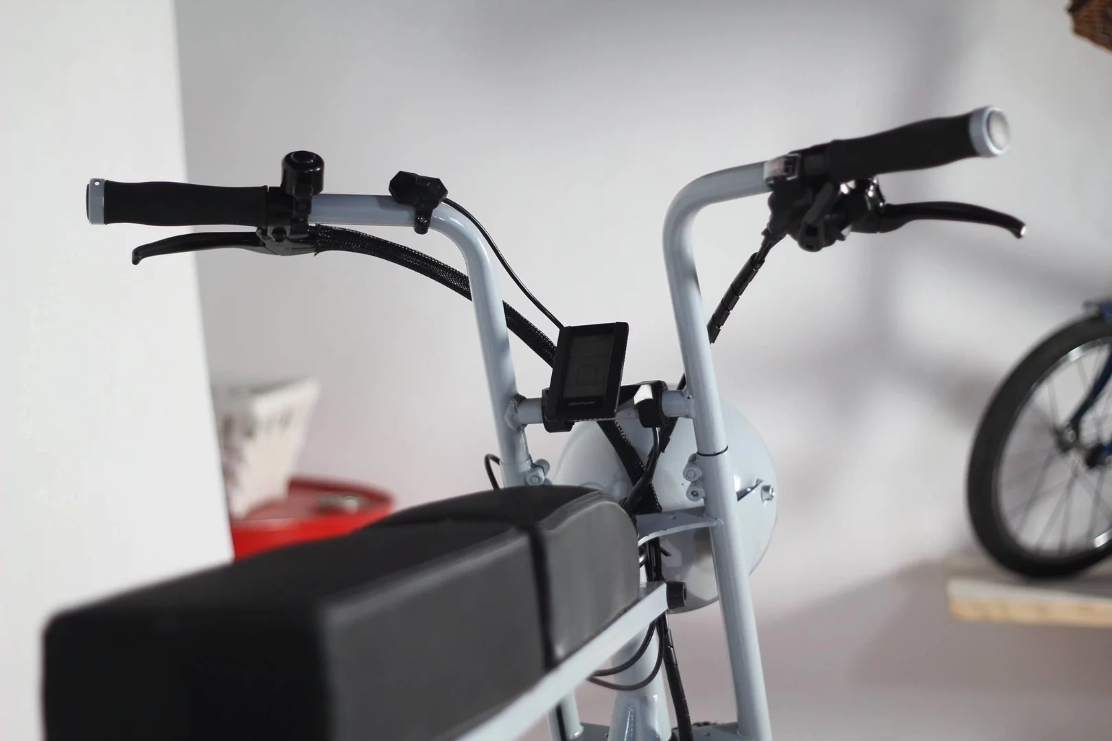 The Moke's long seat and adjustable handlebars make it a one-size-fits-all design