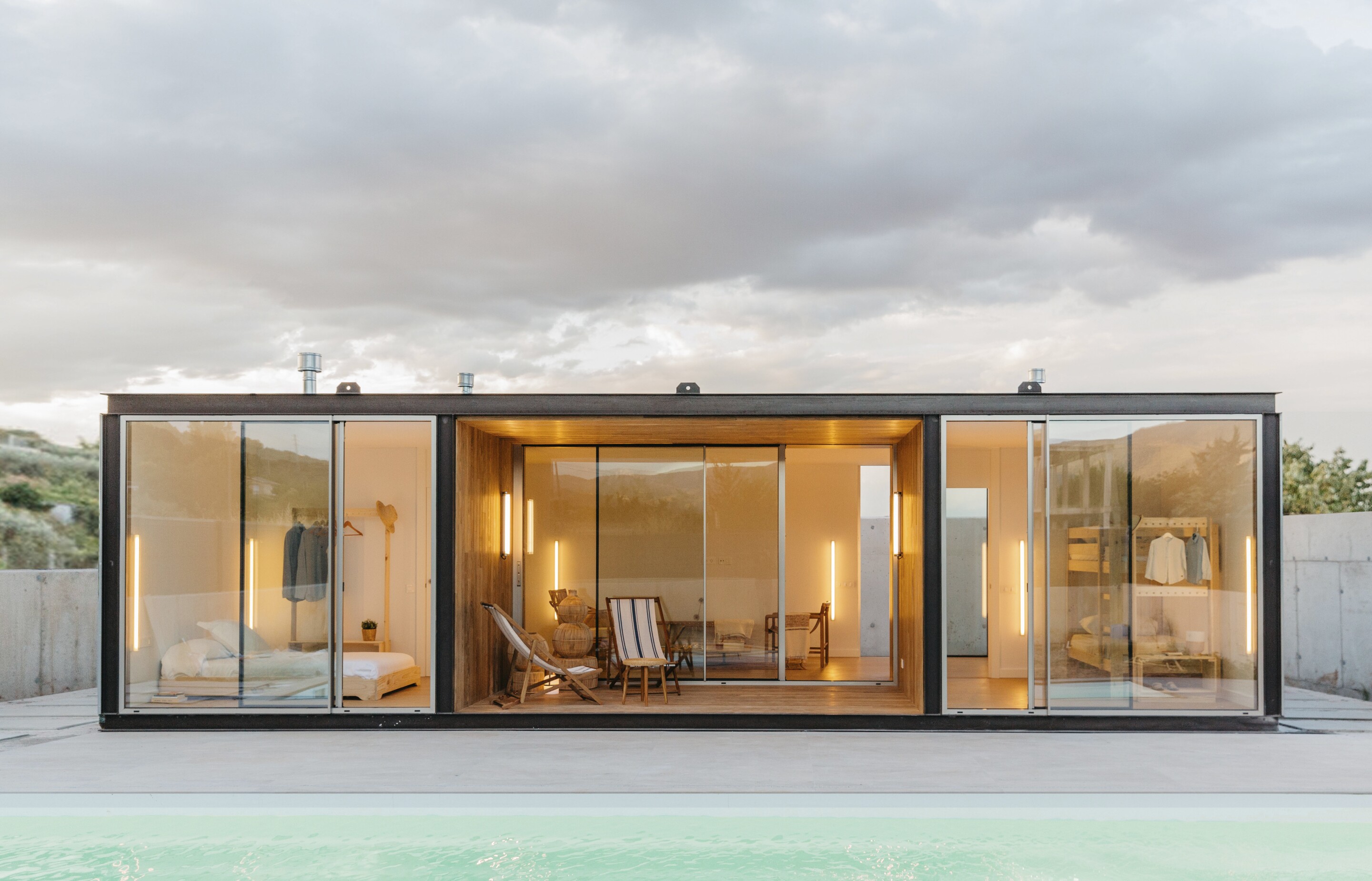 Tini glass house gets a size increase to fit family of three