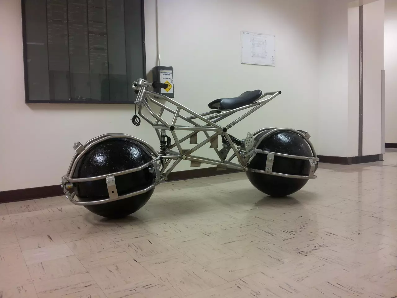 The vehicle's spheres are contained within the swingarms